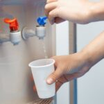 Person Drinking Bottled Water in Tampa